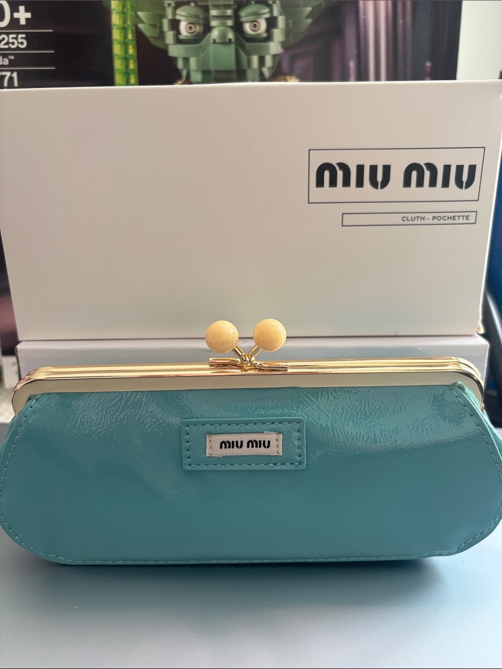GWP Miu Miu Turquoise Patent Clutch with Gold Frame and Cream Ball Clasp